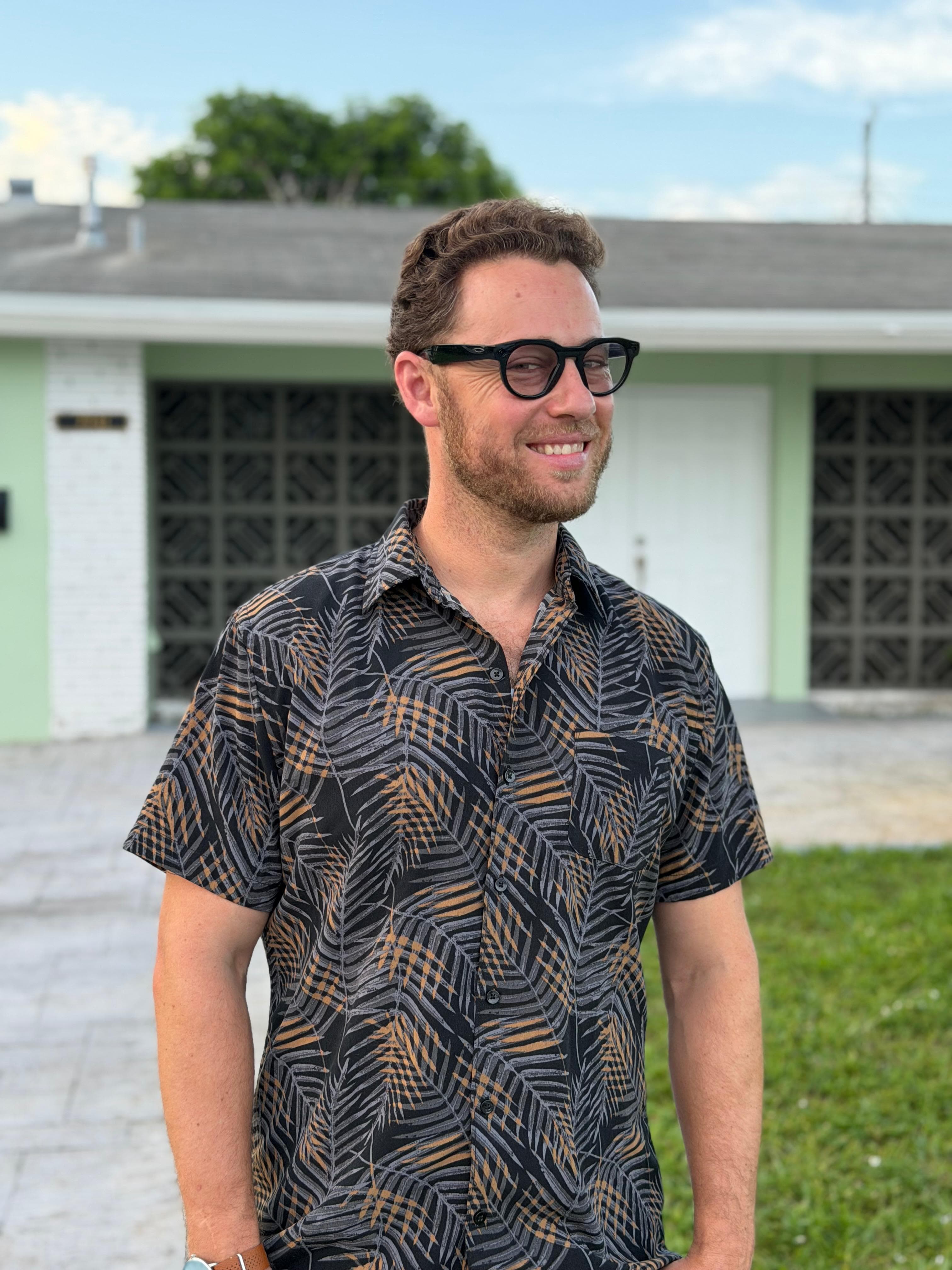 Jonah Stevens outside a single-storey Florida home on a sunny day